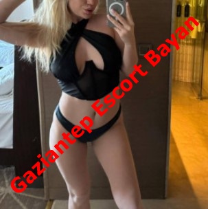 Mirror selfie of a woman in black lingerie posing in a hotel room, with a bold diagonal red text overlay reading 'Gaziantep Escort Bayan' across the image. Mirror selfie of a woman in black lingerie posing in a hotel room, with a bold diagonal red text overlay reading 'Gaziantep Escort Bayan' across the image.