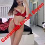 Woman in red lingerie posing in a bedroom with a bold red watermark reading 'Gaziant Escort Bayan'. Woman in red lingerie posing in a bedroom with a bold red watermark reading 'Gaziant Escort Bayan'.