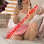 Selfie of a woman in a white lace top and pink skirt posing on a bed, with a red 'Gaziantep Escort Bayan' overlay. Selfie of a woman in a white lace top and pink skirt posing on a bed, with a red 'Gaziantep Escort Bayan' overlay.