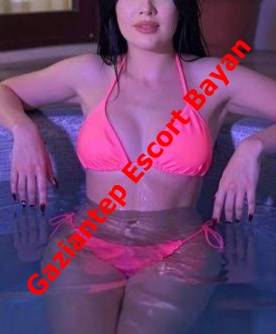 Promotional photo of a woman in a pink bikini lounging in a pool, with red text across the image reading 'Gaziantep Escort Bayan'. Promotional photo of a woman in a pink bikini lounging in a pool, with red text across the image reading 'Gaziantep Escort Bayan'.