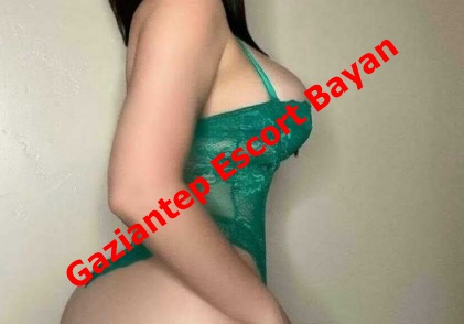Side view of a person wearing a green lingerie bodysuit, with diagonal watermark text reading 'Gaziantep Escort Bayan'. Side view of a person wearing a green lingerie bodysuit, with diagonal watermark text reading 'Gaziantep Escort Bayan'.