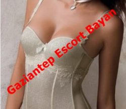 Close-up of a woman in ivory lingerie with a diagonal red watermark reading 'Gaziantep Escort Bayan'.