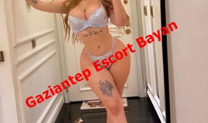 Woman in lingerie posing in a hallway; bold red text 'Gaziantep Escort Bayan' across the image. Woman in lingerie posing in a hallway; bold red text 'Gaziantep Escort Bayan' across the image.